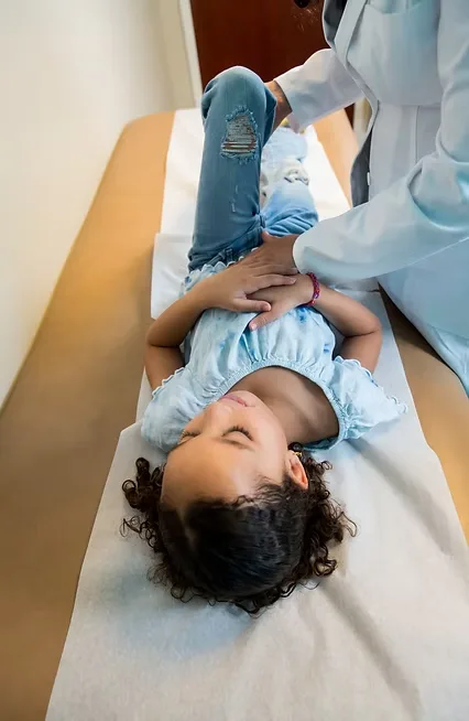 Toddler patient on the exam table at Carolinas Pediatrics in Huntersville NC